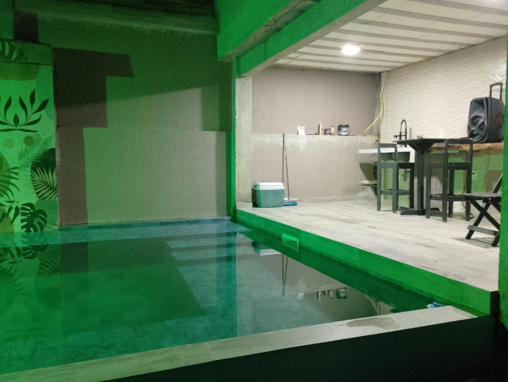 Swimmingpoolen hos eller tæt på Casa na Prainha de Mambucaba