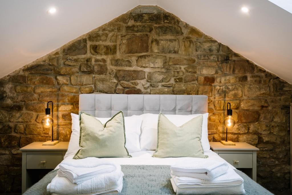 En eller flere senge i et værelse på Sun Street Retreats