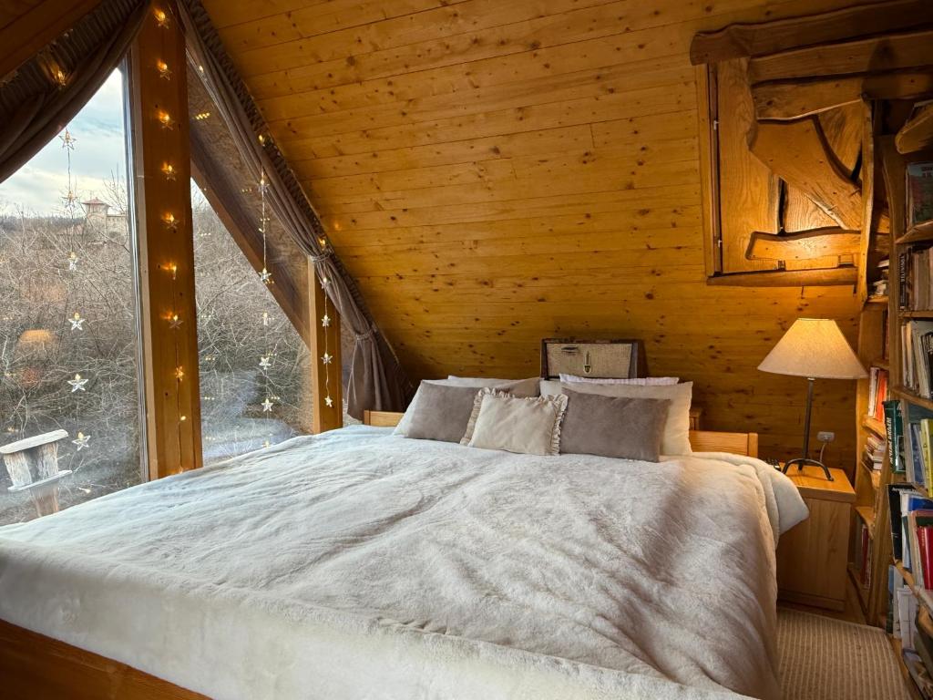 Ένα ή περισσότερα κρεβάτια σε δωμάτιο στο Casa Rustic 1