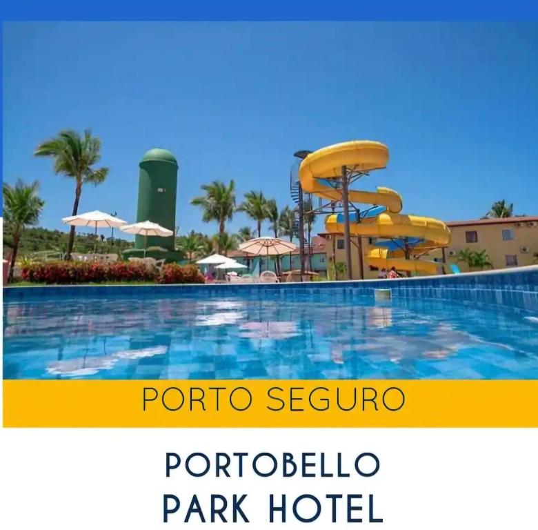 a pool at a resort with a water slide at Portobello in Porto Seguro