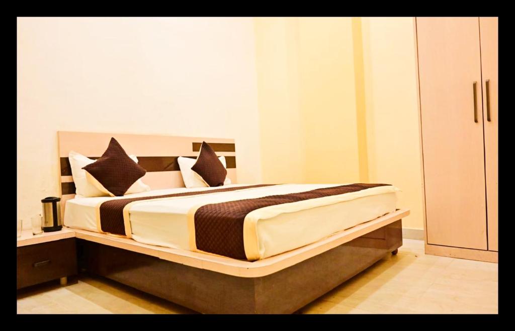 En eller flere senge i et værelse på The In Dira Valley