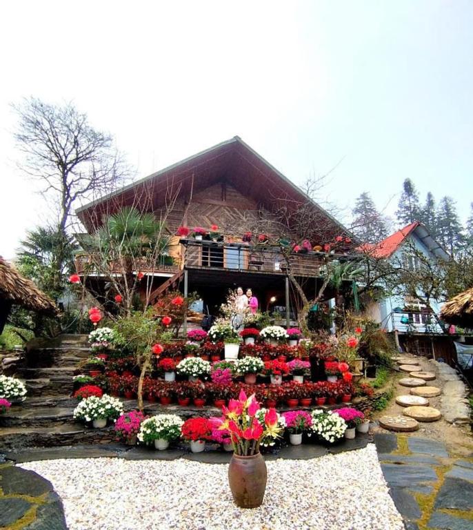 a display of flowers in front of a building at An's Space Sapa in Lao Cai