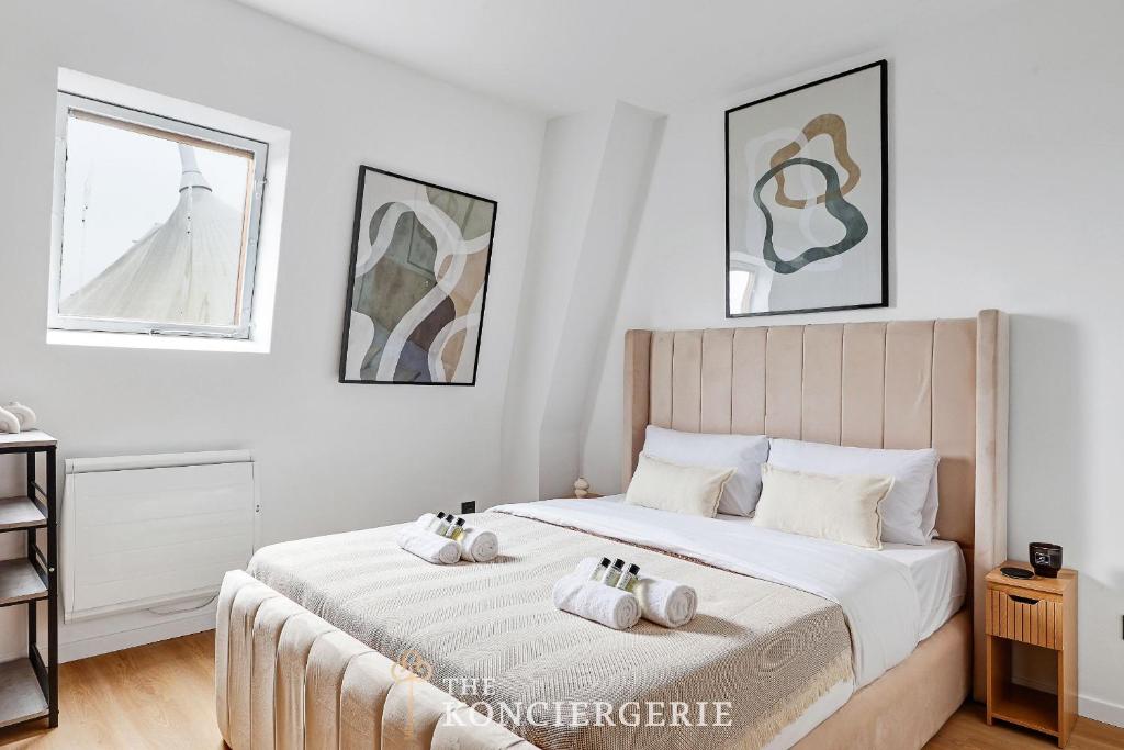 Llit o llits en una habitació de Studio Chic et Cosy - Boulevard Kellermann