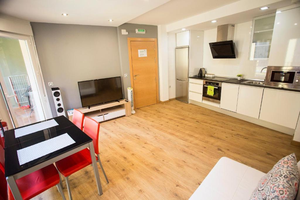 Kuchyň nebo kuchyňský kout v ubytování Apartamentos Amaiur 2