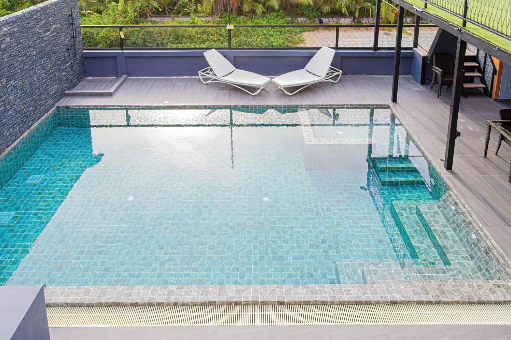 Bazén v ubytování Kathu V pool villa 171 nebo v jeho okolí