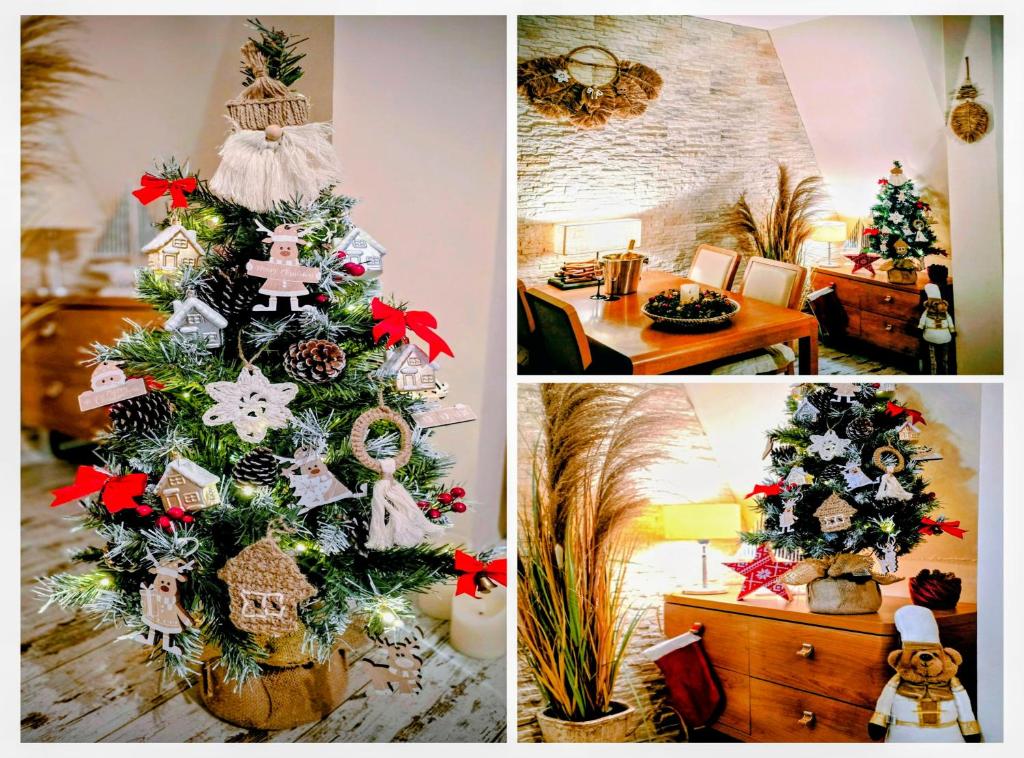 a christmas tree with decorations on it in a room at Baltic Del Mar by Baltic Batavia-Widok na Morze in Świnoujście