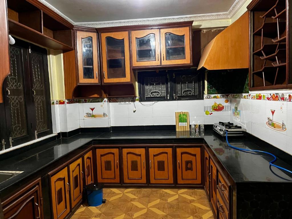 Kuchyň nebo kuchyňský kout v ubytování Amelie Apartments and Stay Inn