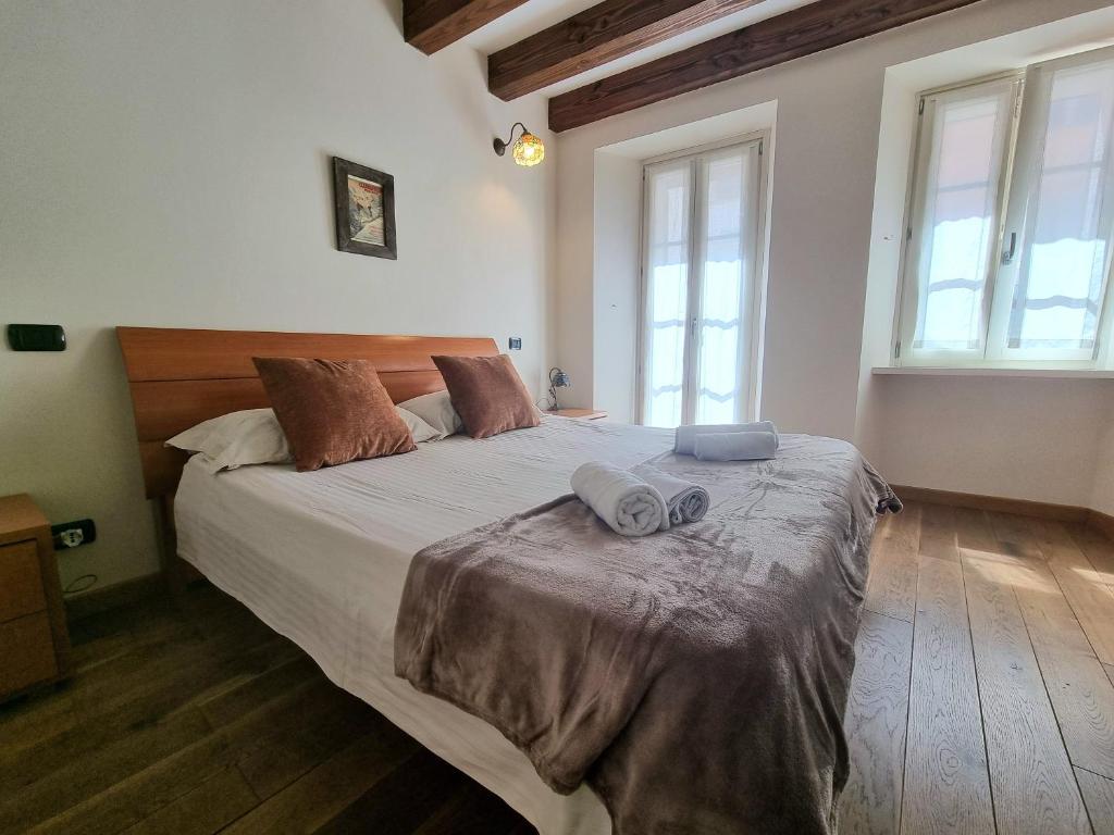 Postel nebo postele na pokoji v ubytování Grace Apartment