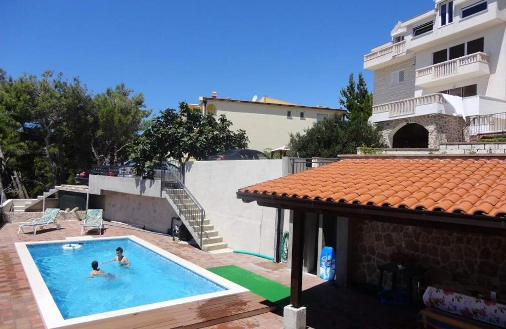 Swimmingpoolen hos eller tæt på Apartments Rose