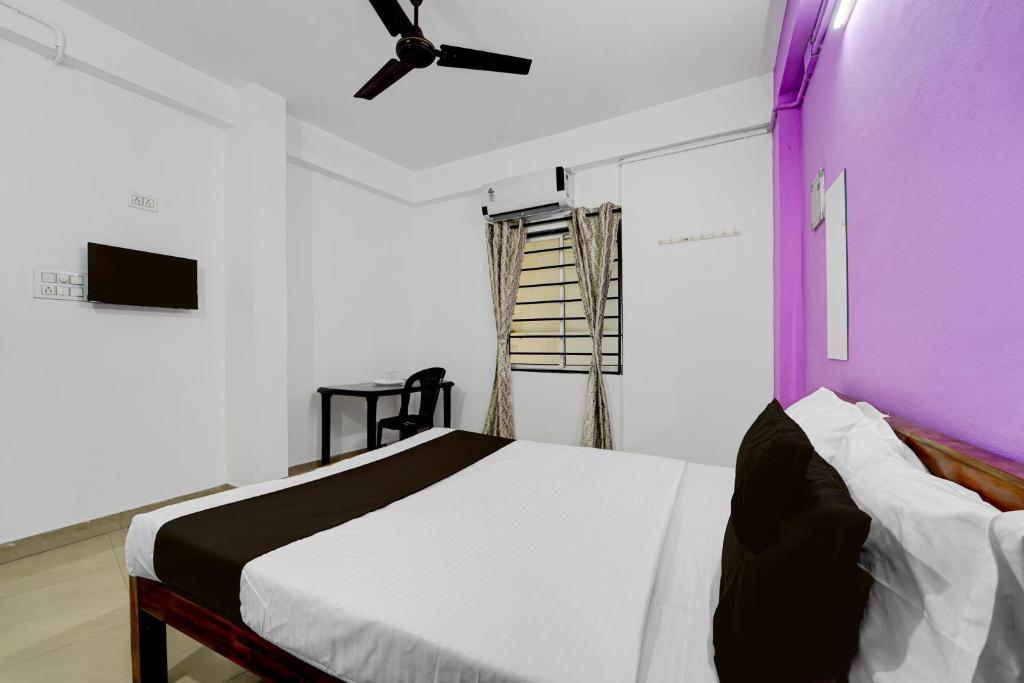 Ένα ή περισσότερα κρεβάτια σε δωμάτιο στο Hotel O HEAVEN REGENCY