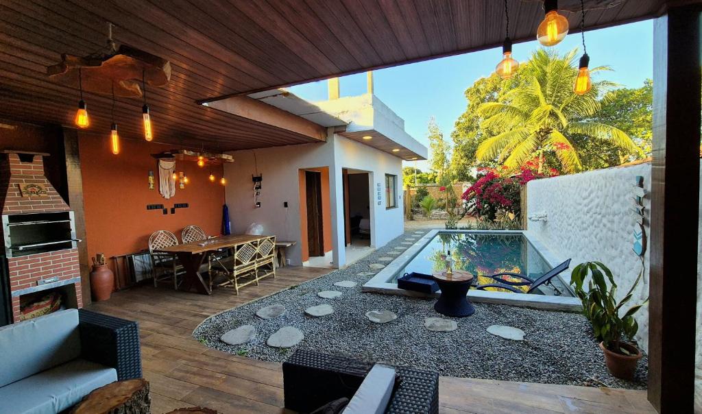 En have udenfor Casa de Praia com Piscina em Maceió - Ipioca - Sauaçuhy