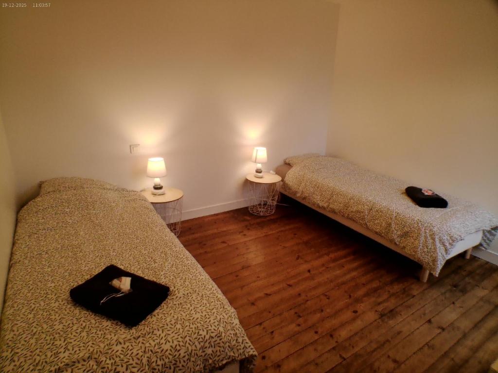 Postel nebo postele na pokoji v ubytování L'ESCAPADE T3 avec terrasse privative