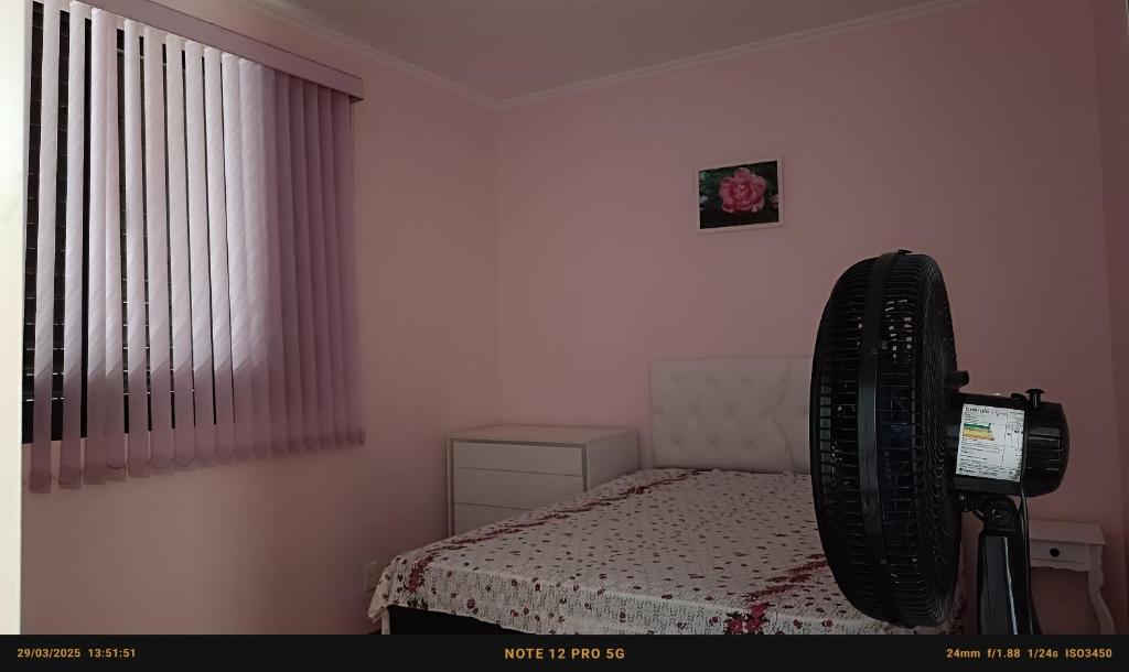 En eller flere senge i et værelse på Apartamento completo piscina churrasqueira