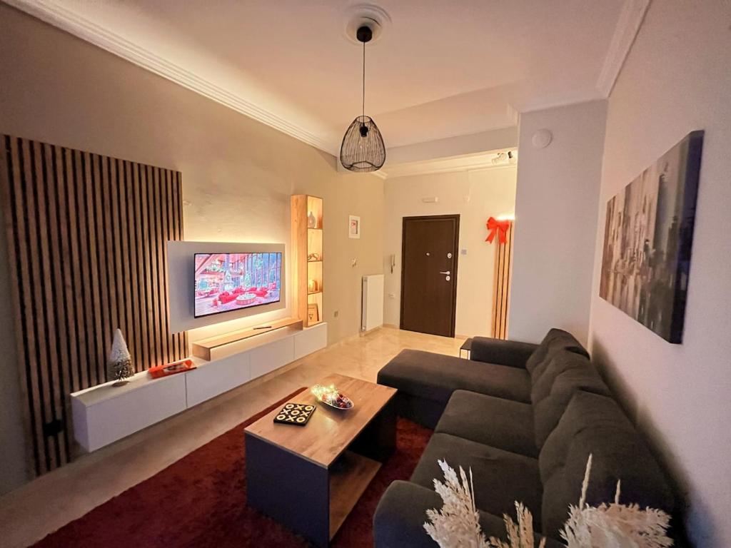 Et tv og/eller underholdning på MaisonCentrale Apartment Downtown