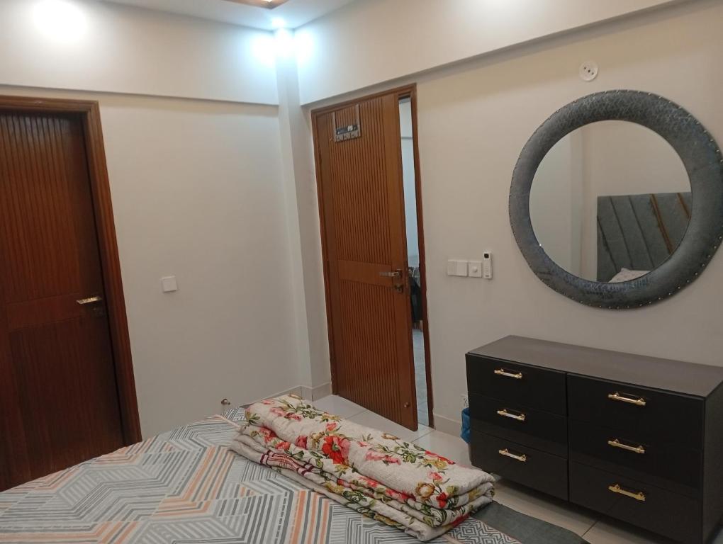 En eller flere senge i et værelse på Saima excellency