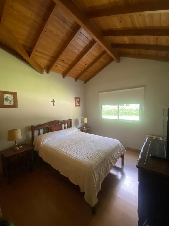 Postel nebo postele na pokoji v ubytování Casa