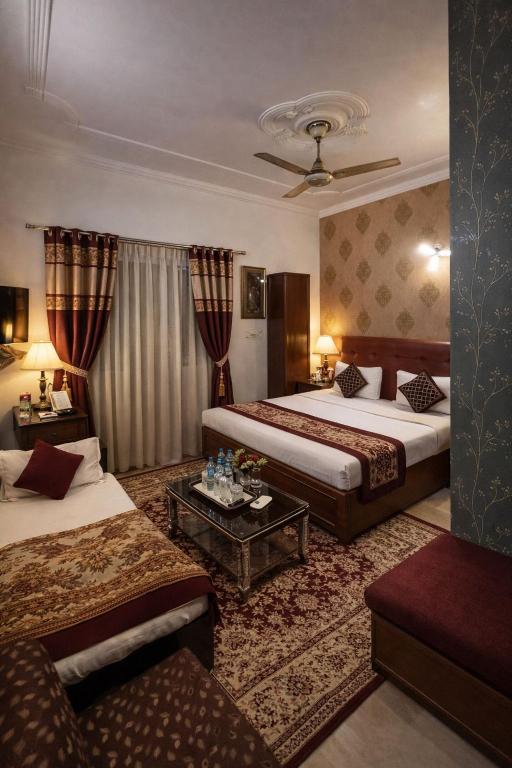 تصویر اتاق‌های The Super Residency - Near Nizamuddin Markaz & Auliya Dargha - تصویر ۲