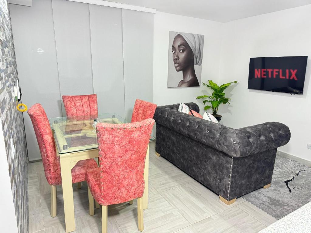 Khu vực ghế ngồi tại Apartamento Gold