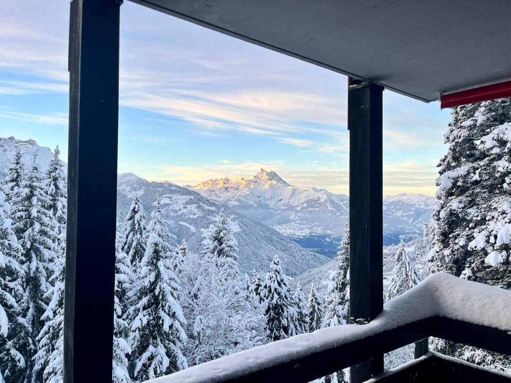 Nespecifikovaný výhled na hory nebo výhled na hory při pohledu z apartmánu