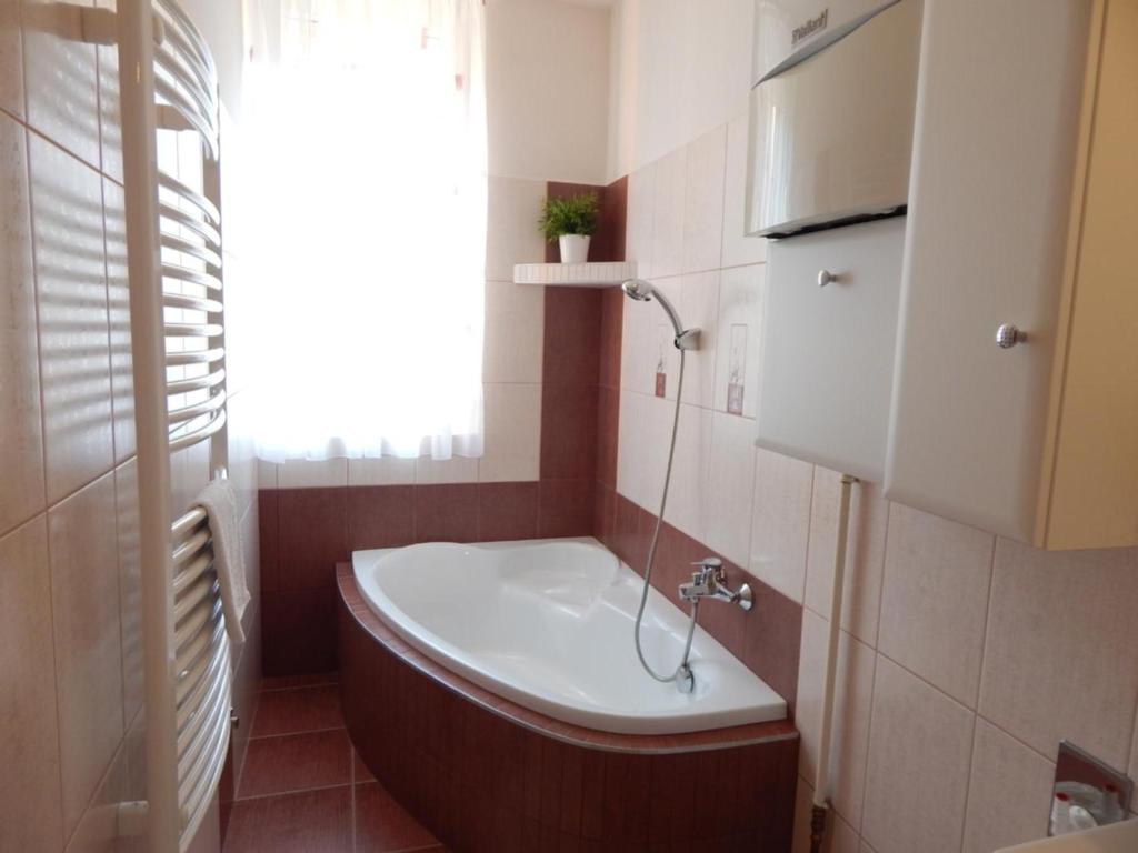 Kúpeľňa v ubytovaní Boros Apartman