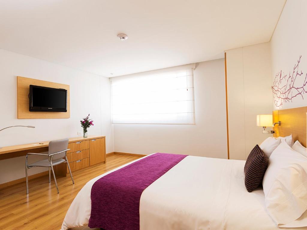 Postel nebo postele na pokoji v ubytování Hotel bh Parque 93