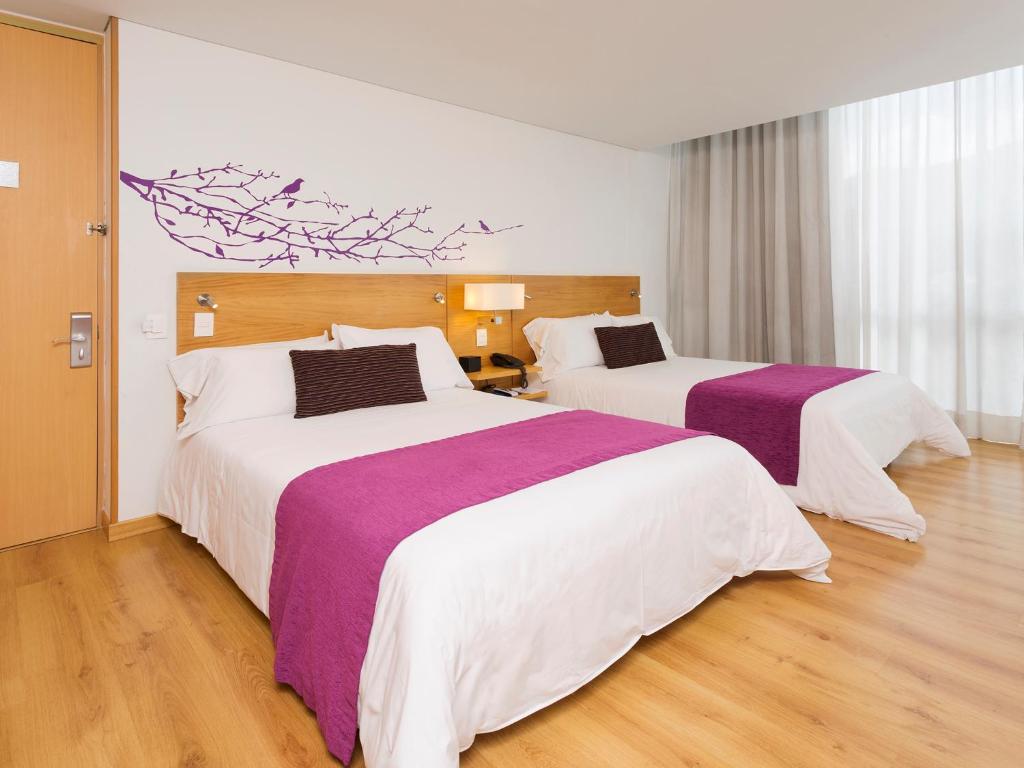 Postel nebo postele na pokoji v ubytování Hotel bh Parque 93