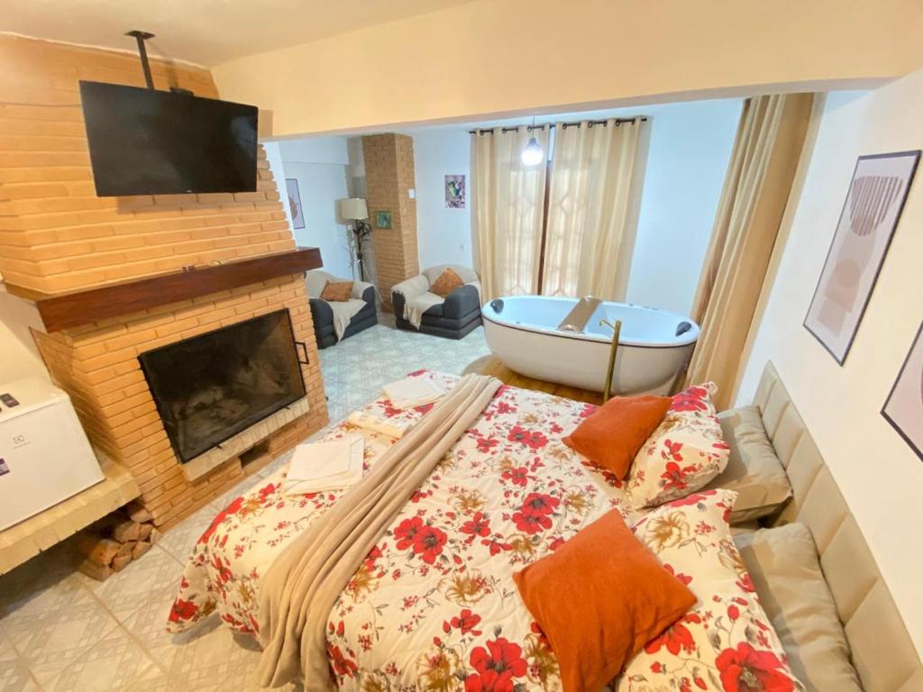 En eller flere senge i et værelse på Villaggio Farnese