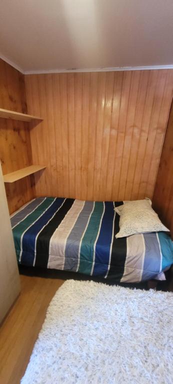 En eller flere senge i et værelse på Patagonia In Sur