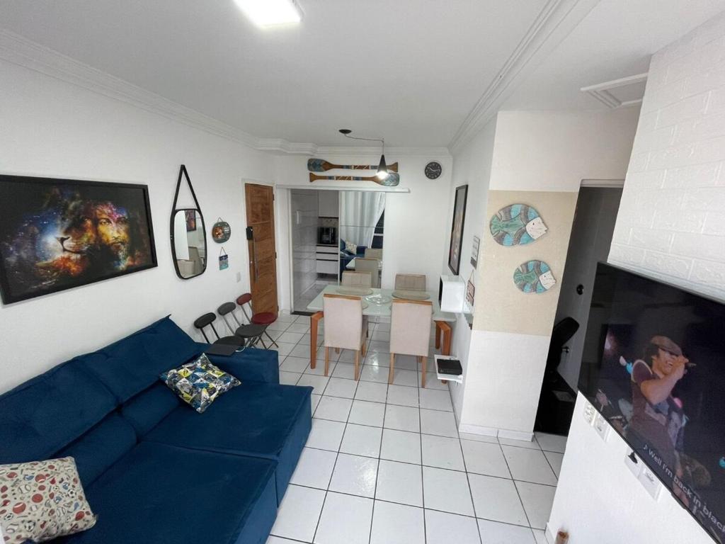 Et opholdsområde på Apt perto da praia com quarto de casal