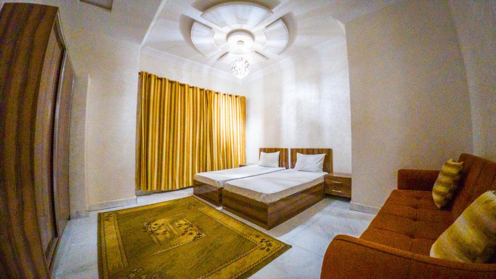 Postel nebo postele na pokoji v ubytování Appartements hôteliers Hayat