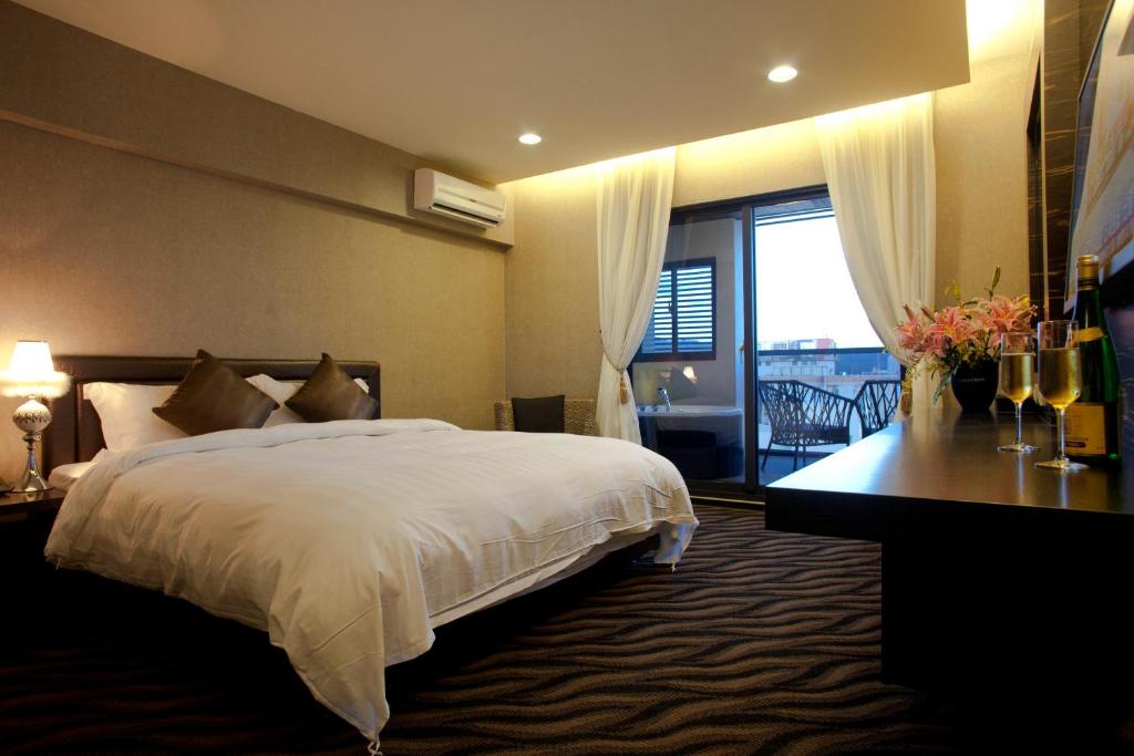 Ένα ή περισσότερα κρεβάτια σε δωμάτιο στο Wolken Lodge