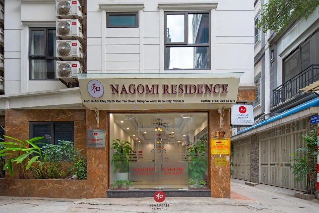 a store with a sign for a korean restaurant at Nagomi Residence in Hanoi