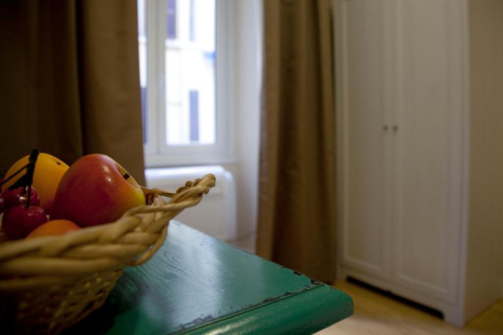 Łóżko lub łóżka w pokoju w obiekcie Residenza Dei Gracchi