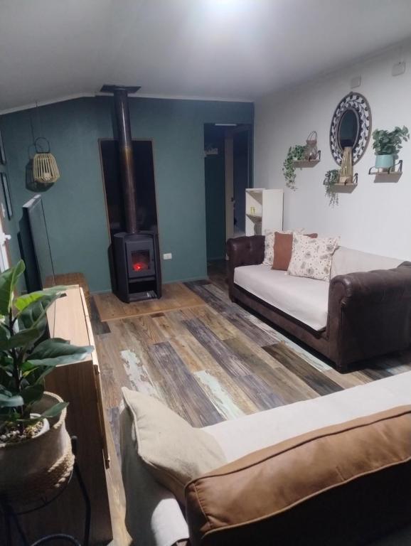 Ένα ή περισσότερα κρεβάτια σε δωμάτιο στο Temporada de verano Puerto Varas