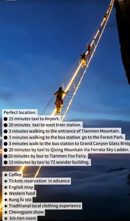 a screenshot of a website with people on a pole at Shan Tao Inn -山韬客栈- Good location-English reception-Ticket service-Tourism planing-coffee-Laundry-kung fu Tea-Drone gopro rental in Zhangjiajie