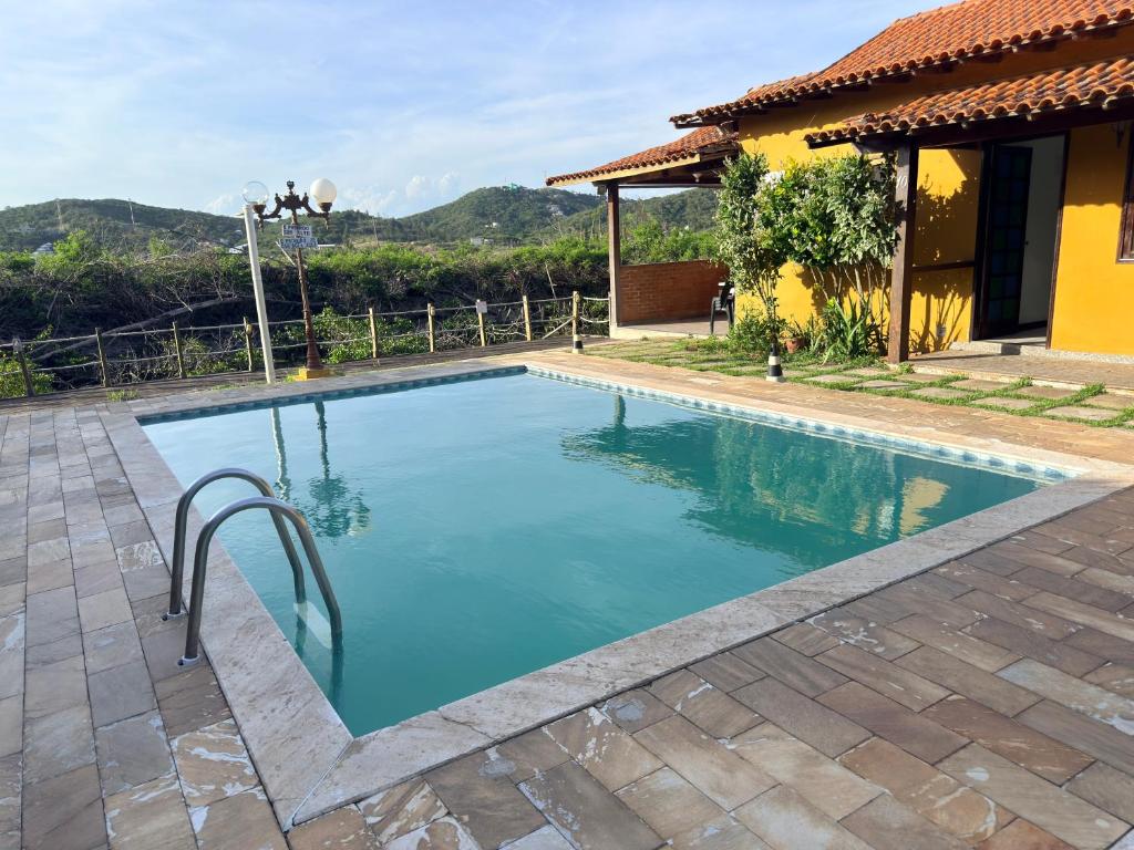 Hồ bơi trong/gần Casa aconchegante na beira de canal