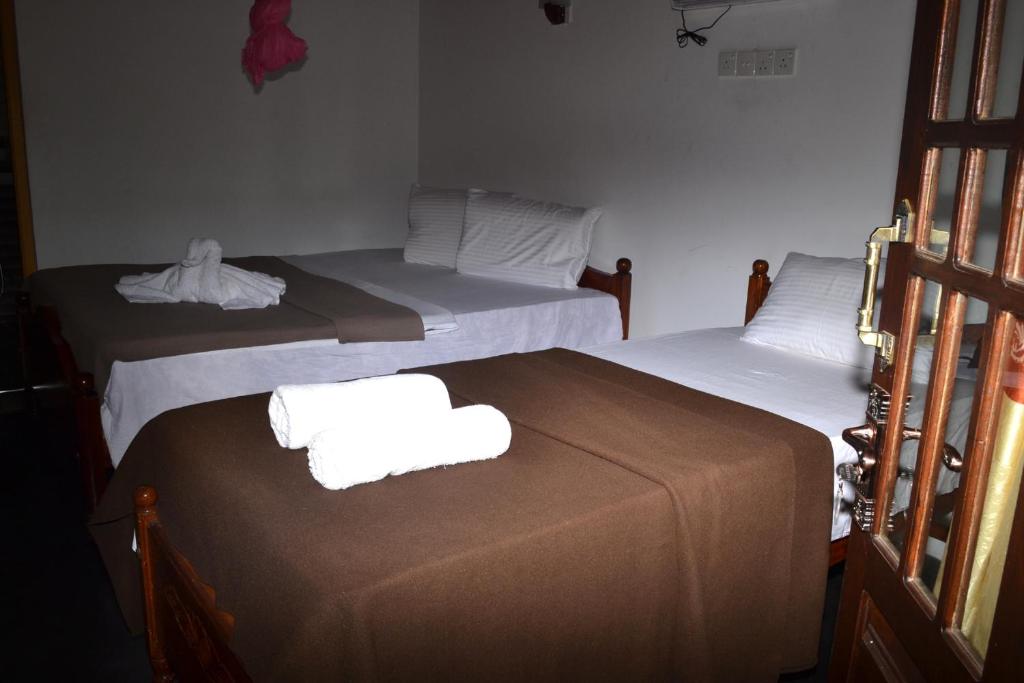 Postel nebo postele na pokoji v ubytování Villa Eden Paradise