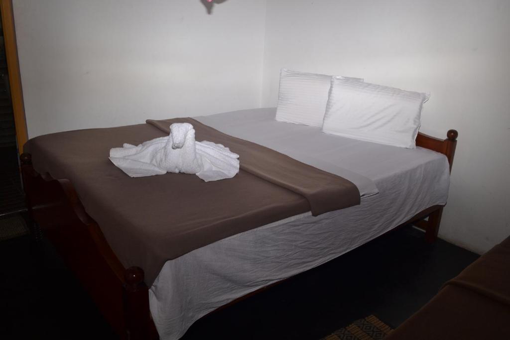 Postel nebo postele na pokoji v ubytování Villa Eden Paradise