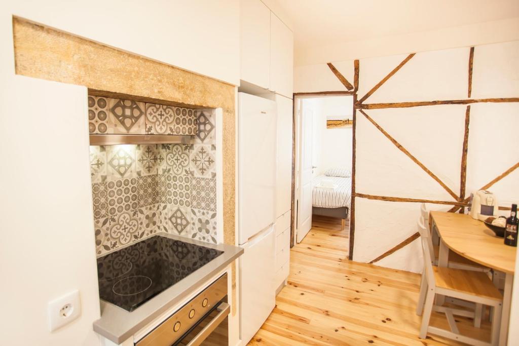 Kuchyň nebo kuchyňský kout v ubytování Graça Traditional 2 bedroom apartment
