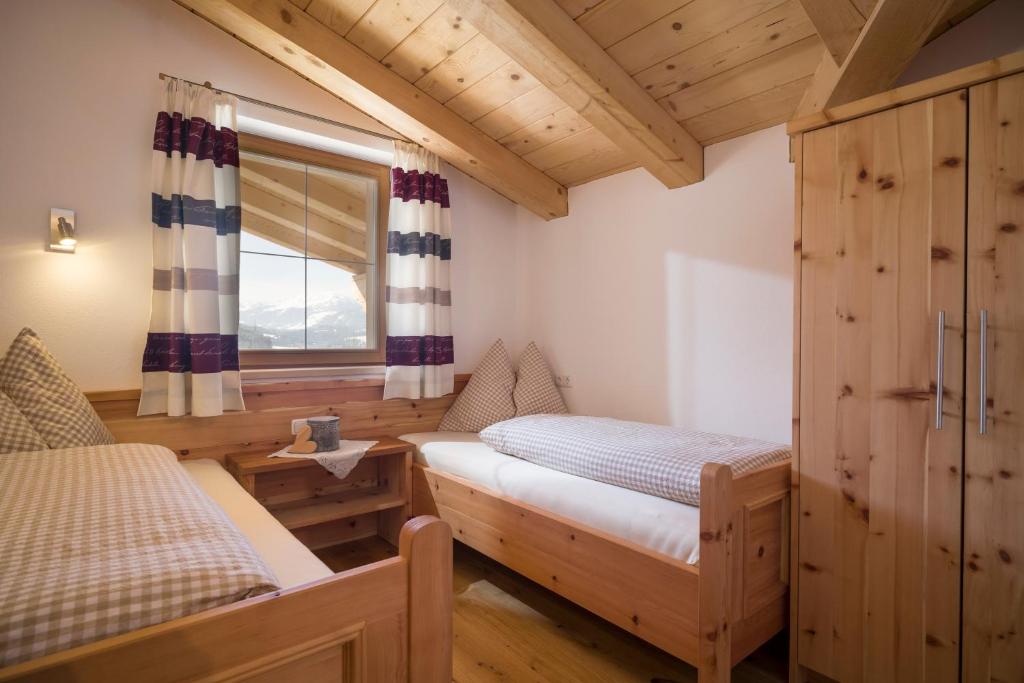 Posteľ alebo postele v izbe v ubytovaní Griesbachhof-Wilder Kaiser