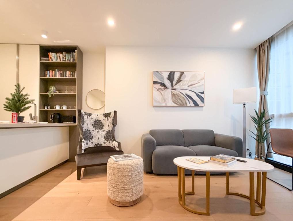 Et opholdsområde på Aspire Boutique Condo Melbourne CBD