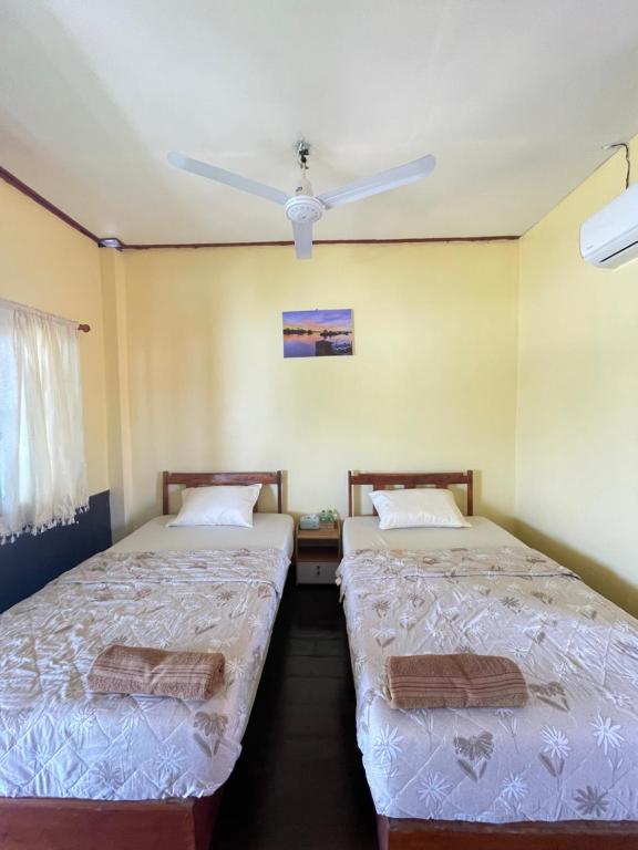 Postel nebo postele na pokoji v ubytování Tena Guest House