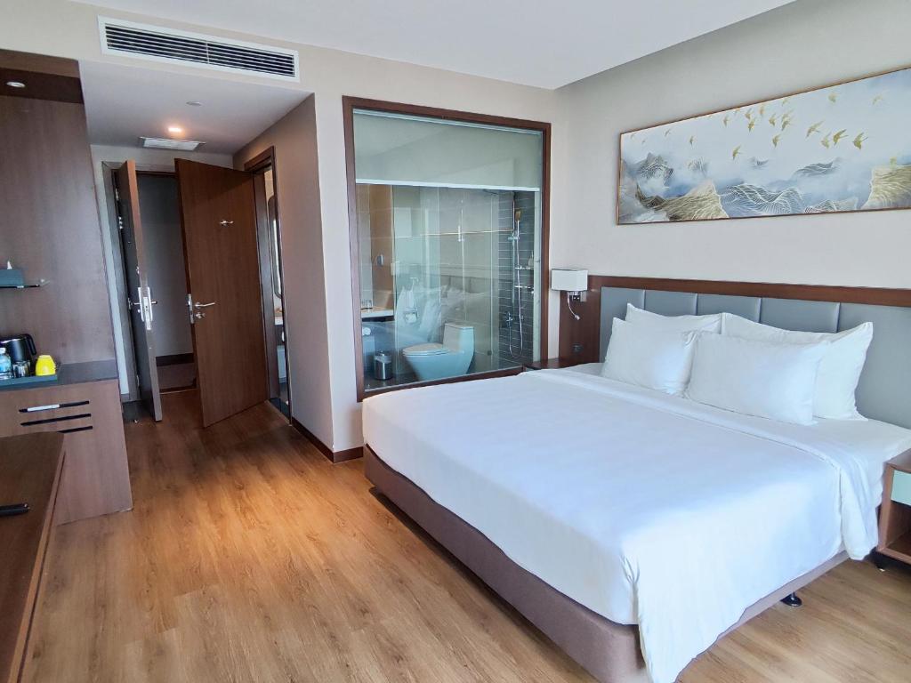 Phòng Deluxe Đôi hoặc 2 giường đơn nhìn ra 1 góc biển
