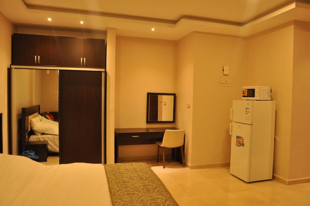 Panda Hotel Apartments - キングスタジオ ソファベッド付