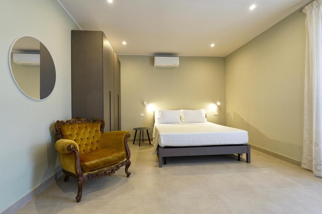 Giường trong phòng chung tại Domus Fabia - Rooms & Apartments