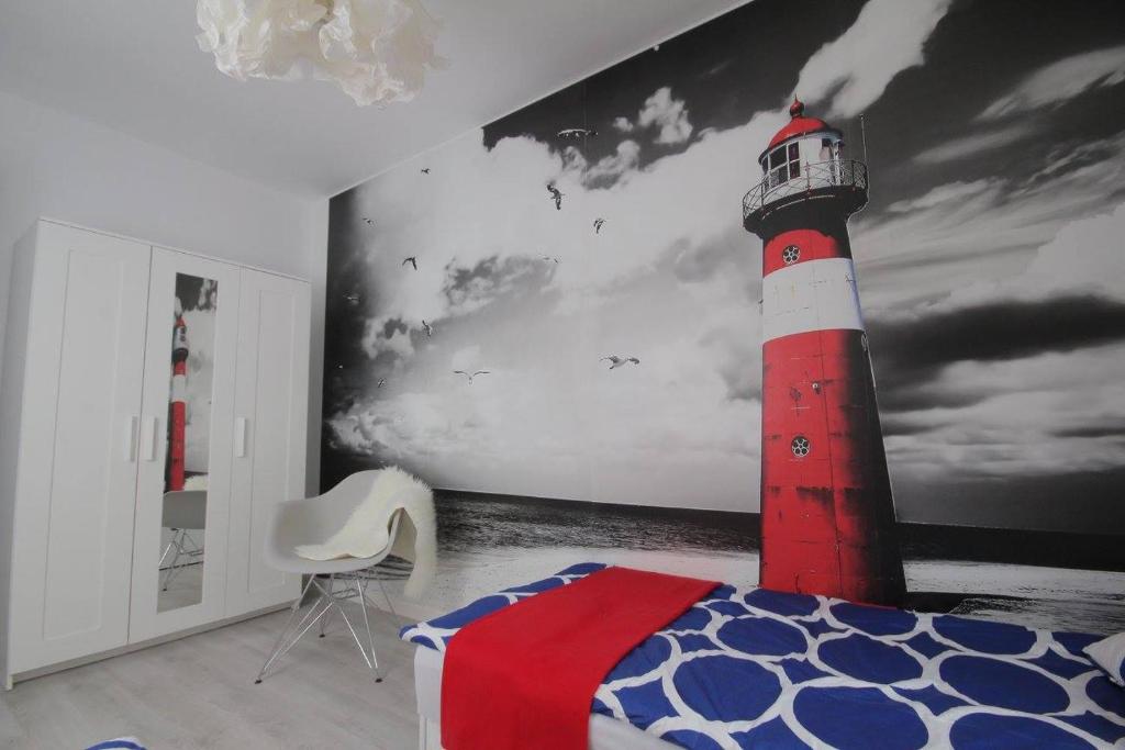Posteľ alebo postele v izbe v ubytovaní Apartament Morski
