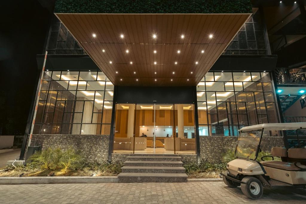 a building with a bunch of lights on it at The Aralia in Dehradun