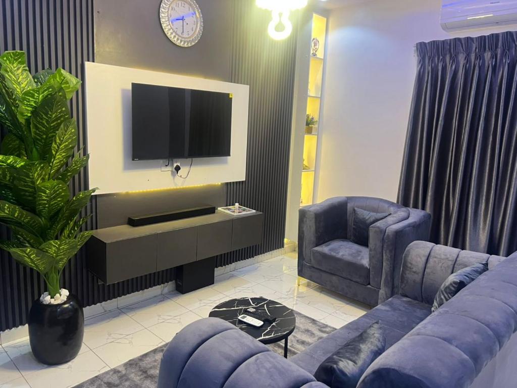 TV a/nebo společenská místnost v ubytování KUNBIZ APARTMENTs