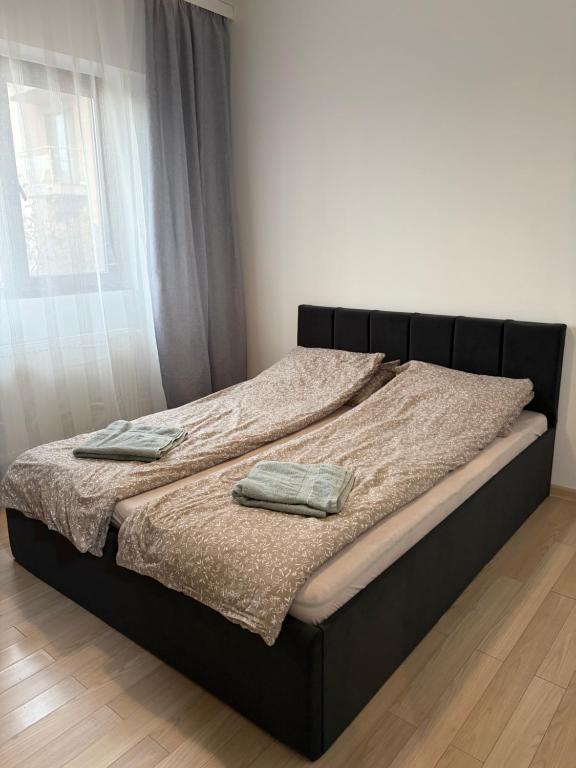 Giường trong phòng chung tại Class Park Residence