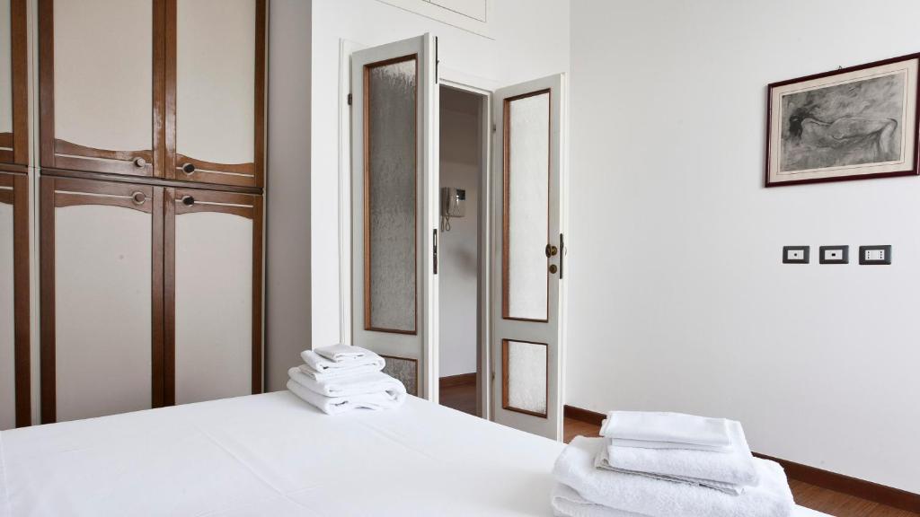 A bed or beds in a room at Italianway-Piazza Firenze